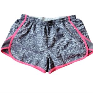 Under Armour gray and pink athletic shorts women’s size Medium Semi Fitted